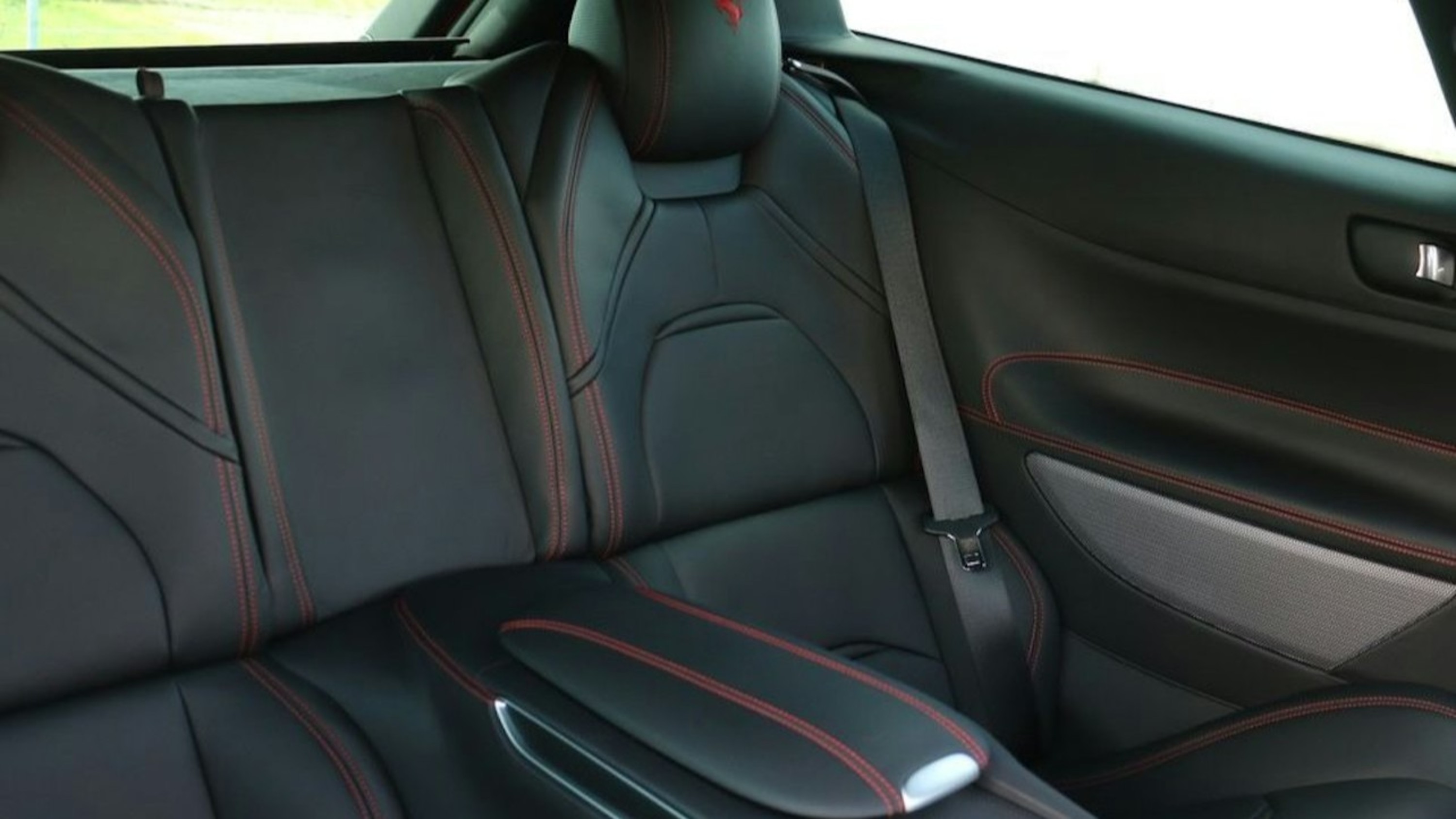 Spacious and luxurious rear seating of the Ferrari GTC4Lusso, crafted for ultimate comfort for passengers