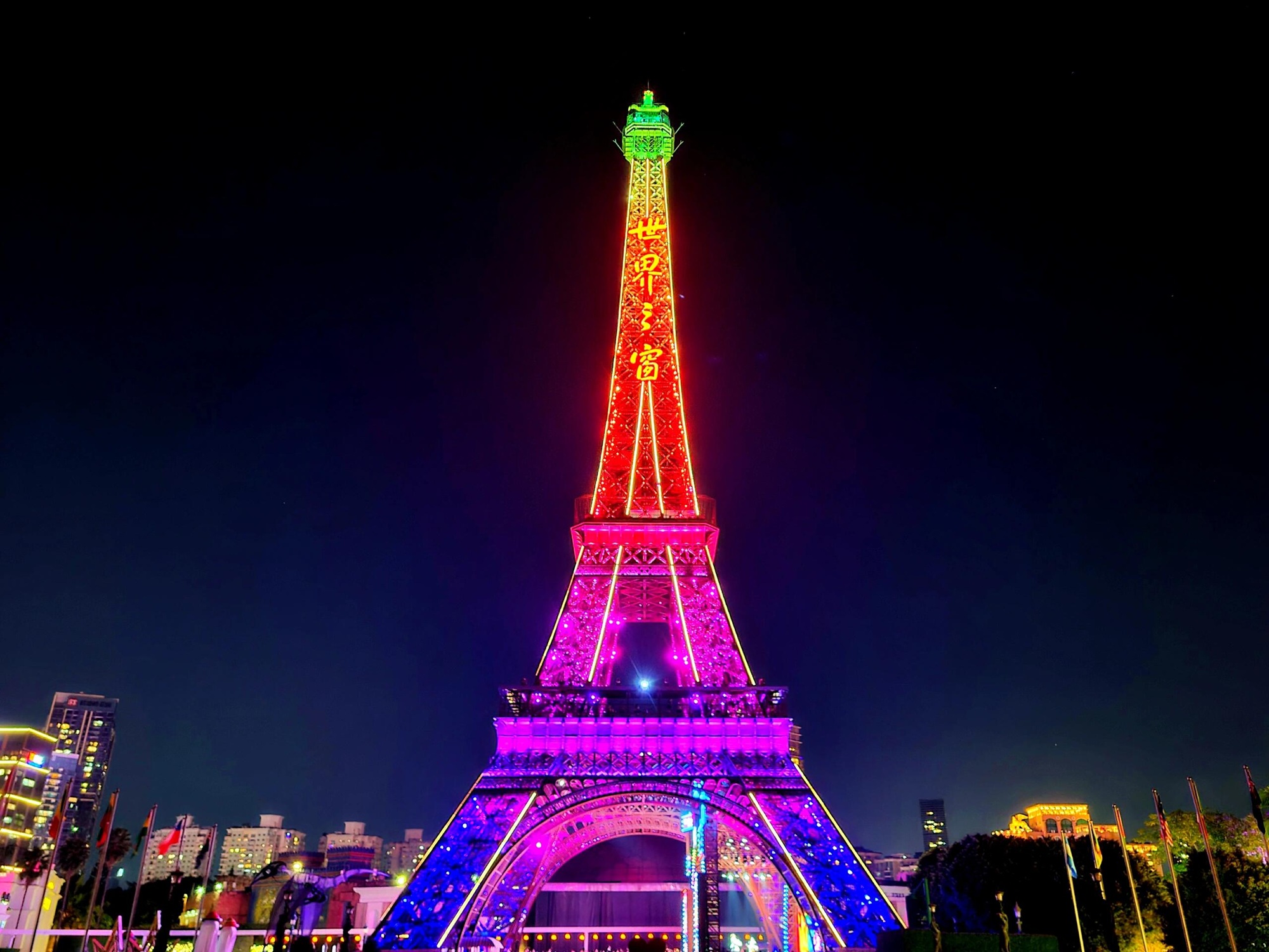 Window of the World, a collection of global landmarks, the tower is beautiful during the day and neon lights at night, taking in the world's wonders
