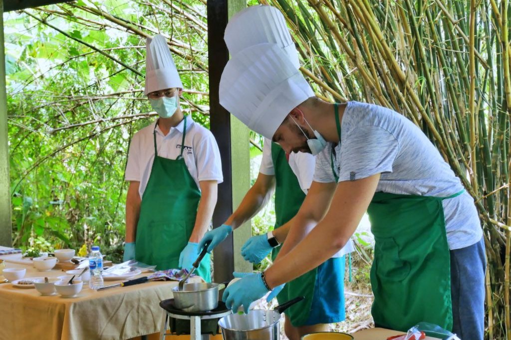 Guests cooking their Thai meal