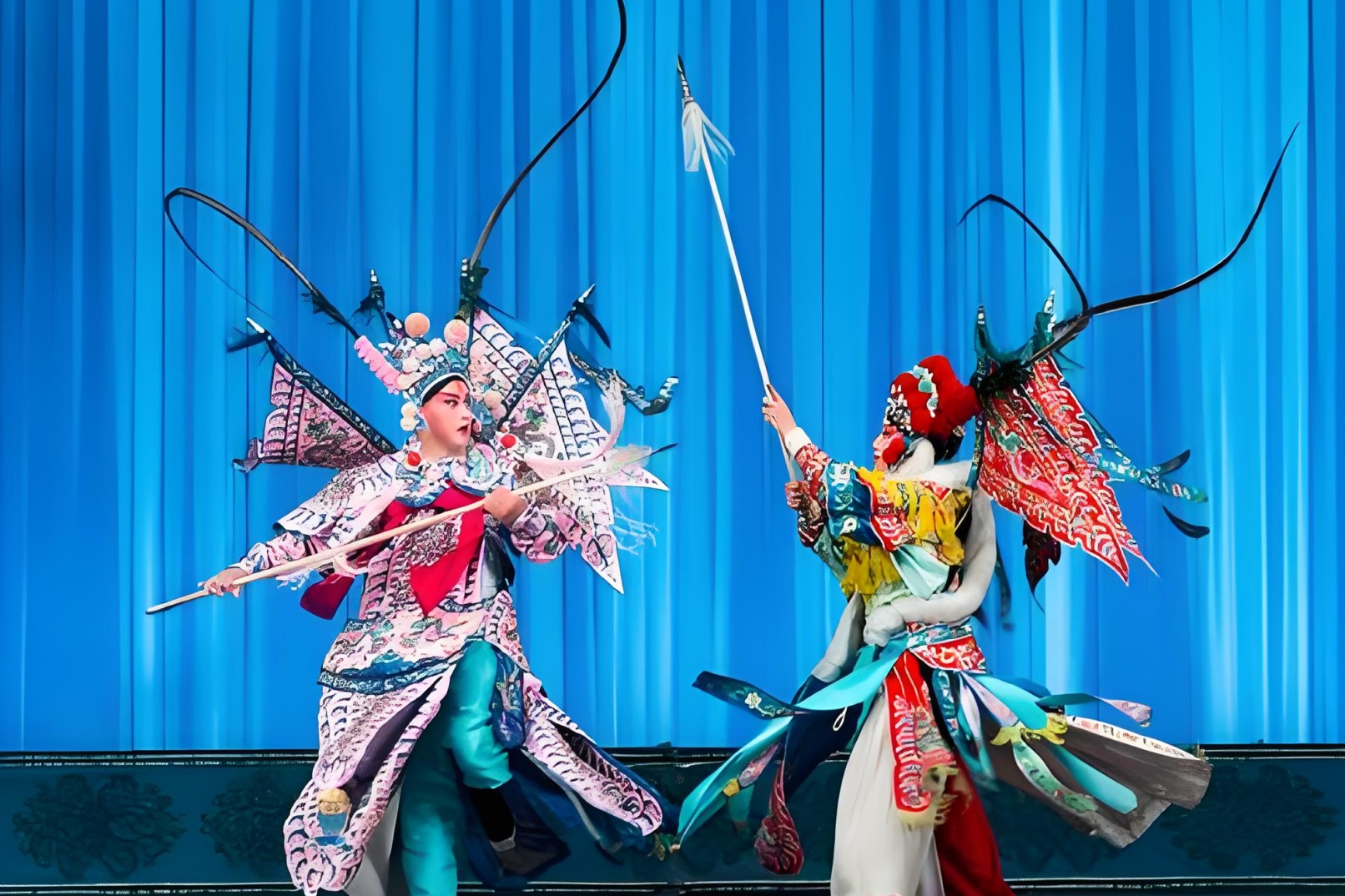Visit Beijing, watch Peking Opera, eat roast duck, see giant pandas, and taste special food attractions