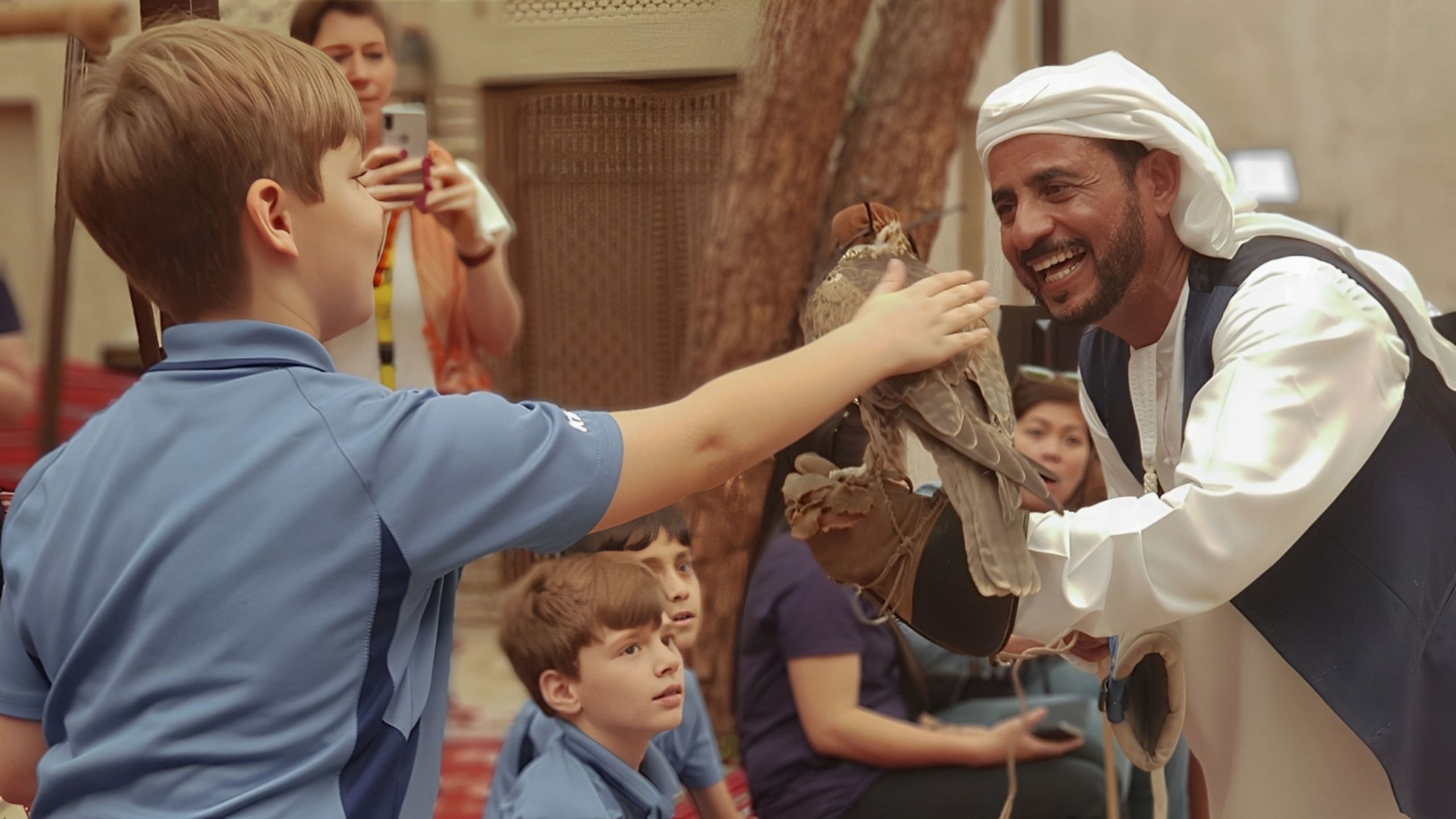 Hold a majestic falcon and take an unforgettable photo in the Dubai desert