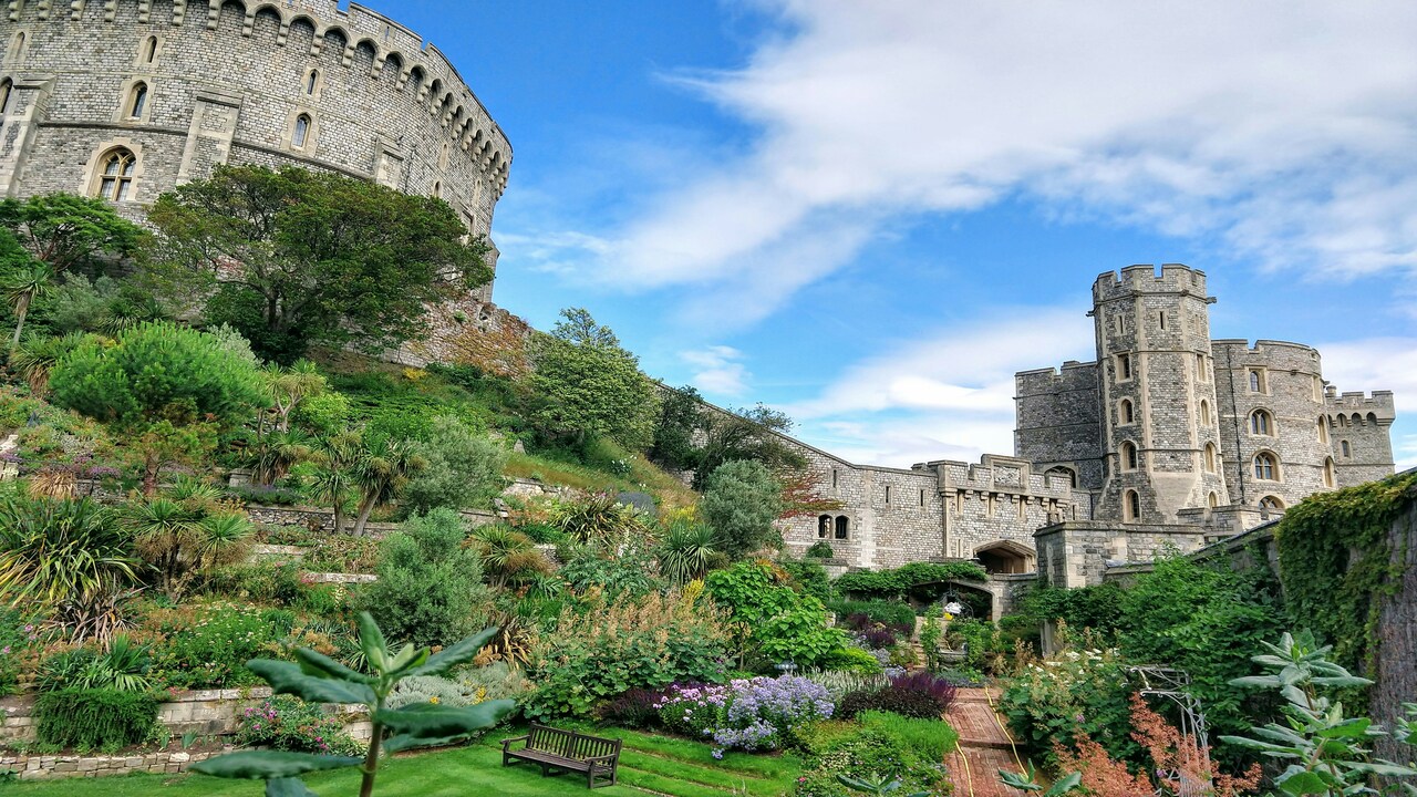 Windsor Castle boasts over 900 years of royal history, and is renowned for its magnificent State Apartments, art collection, and St. George's Chapel weddings. It is the Queen's favorite royal residence.