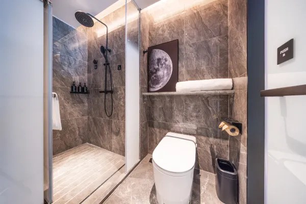Hotel guest room bathing area interior environment display map
