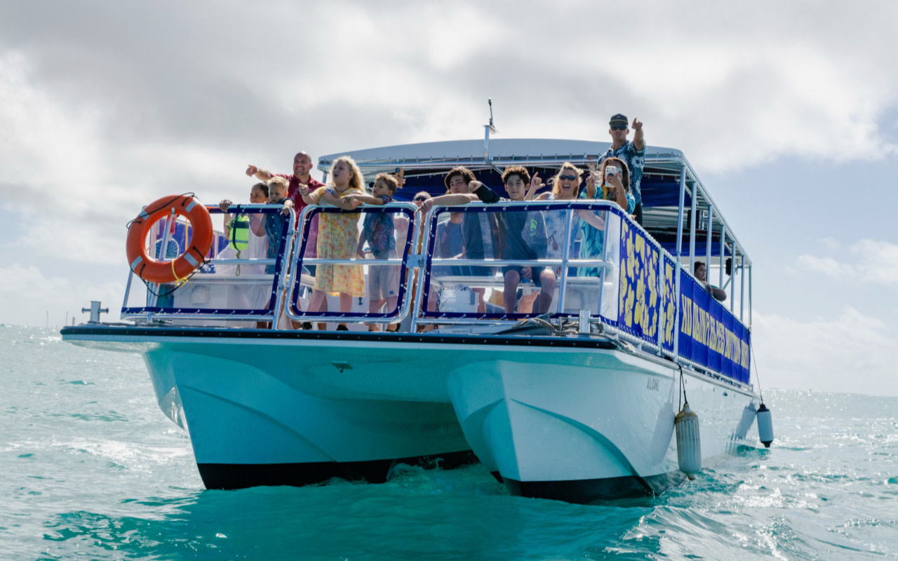 Sunset or daytime Ko Olina glass bottom boat experience