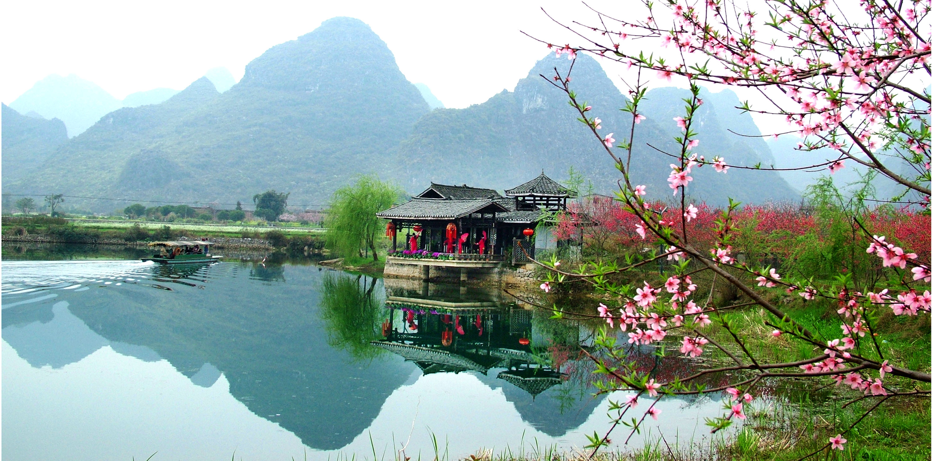 Guilin Li River 4-star Cruise + Yulong River Bamboo Rafting + Xanadu Xiangong Mountain 2-Day Private Tour