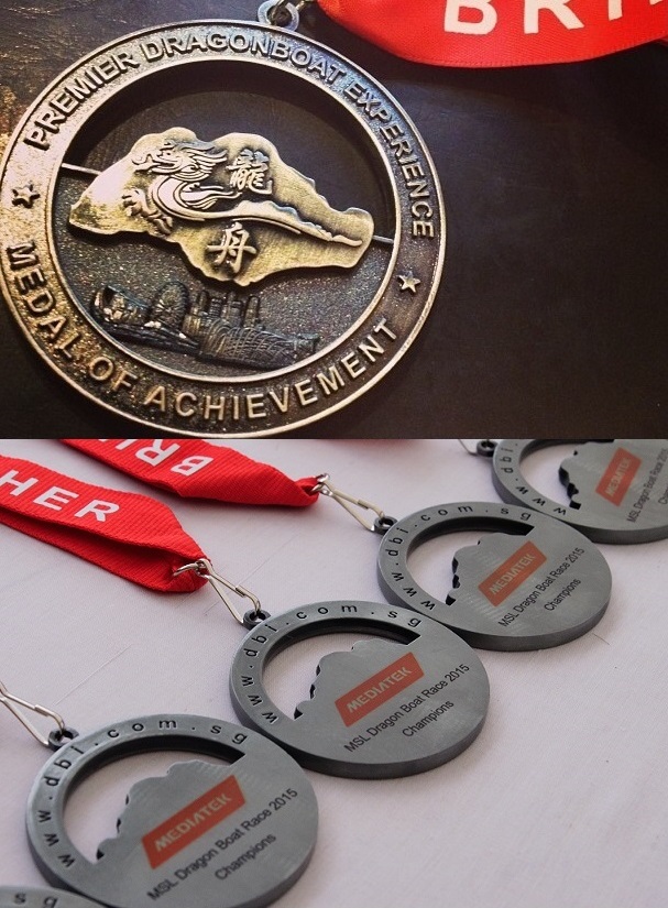 medals offered to clients with 3D engraving of iconic landmarks carved around the island of Singapore