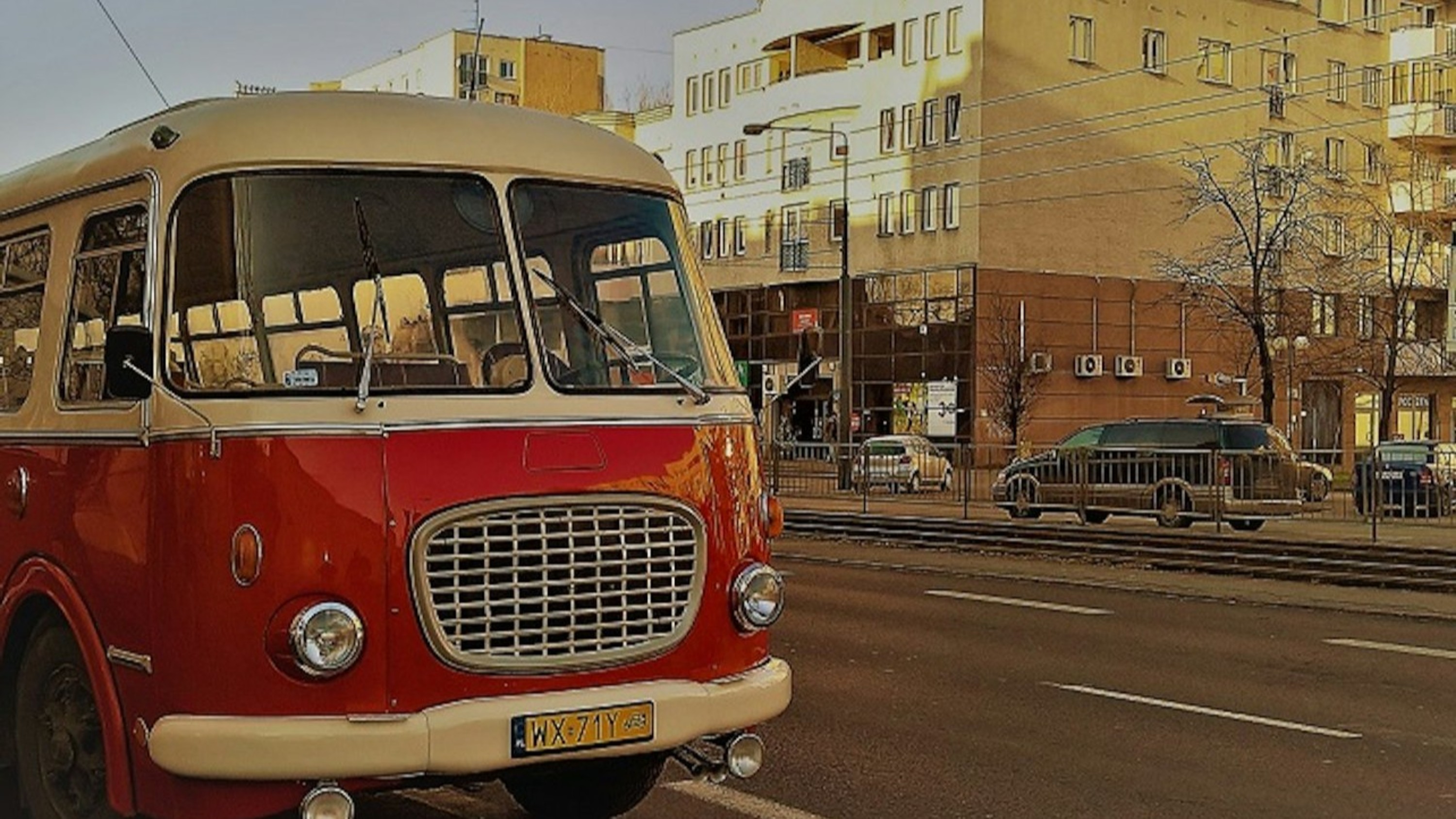 Experience nostalgia and urban charm aboard a classic retro bus through Warsaw's streets