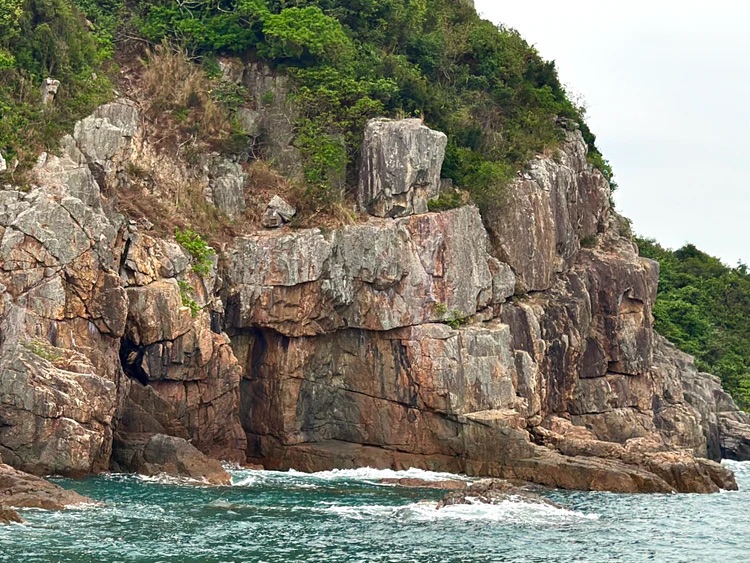 Robot Rock, Sharp Island, Hong Kong UNESCO Global Geopark (Yacht Cruise through Four Sea Arches Volcano in Hong Kong)