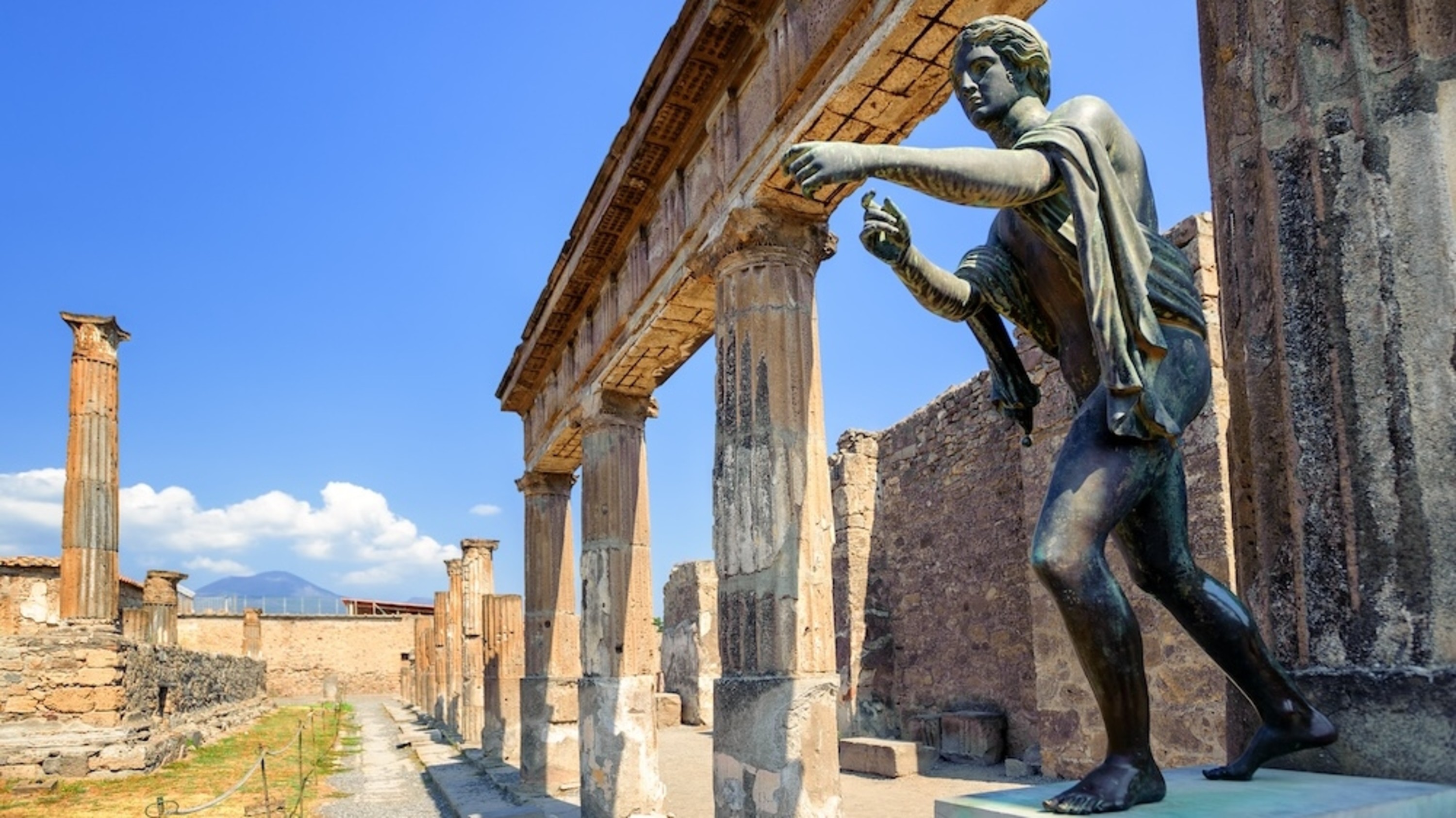 Statue among the Pompeii ruins, offering a glimpse into ancient Roman art and culture