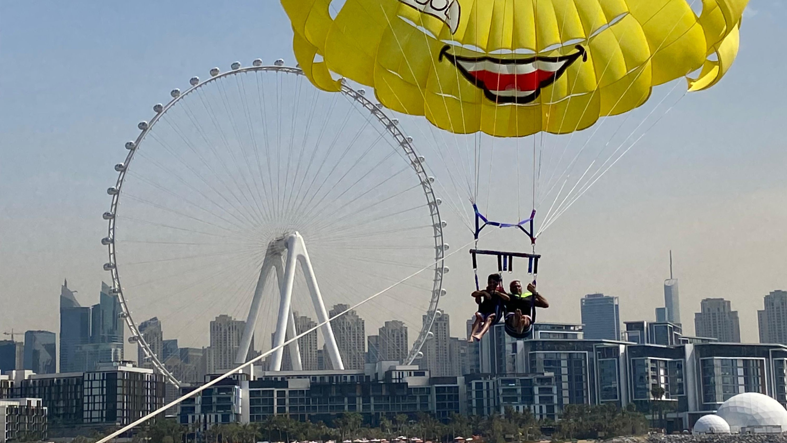 Palm, JBR and Marina views parasailing experience in Dubai 