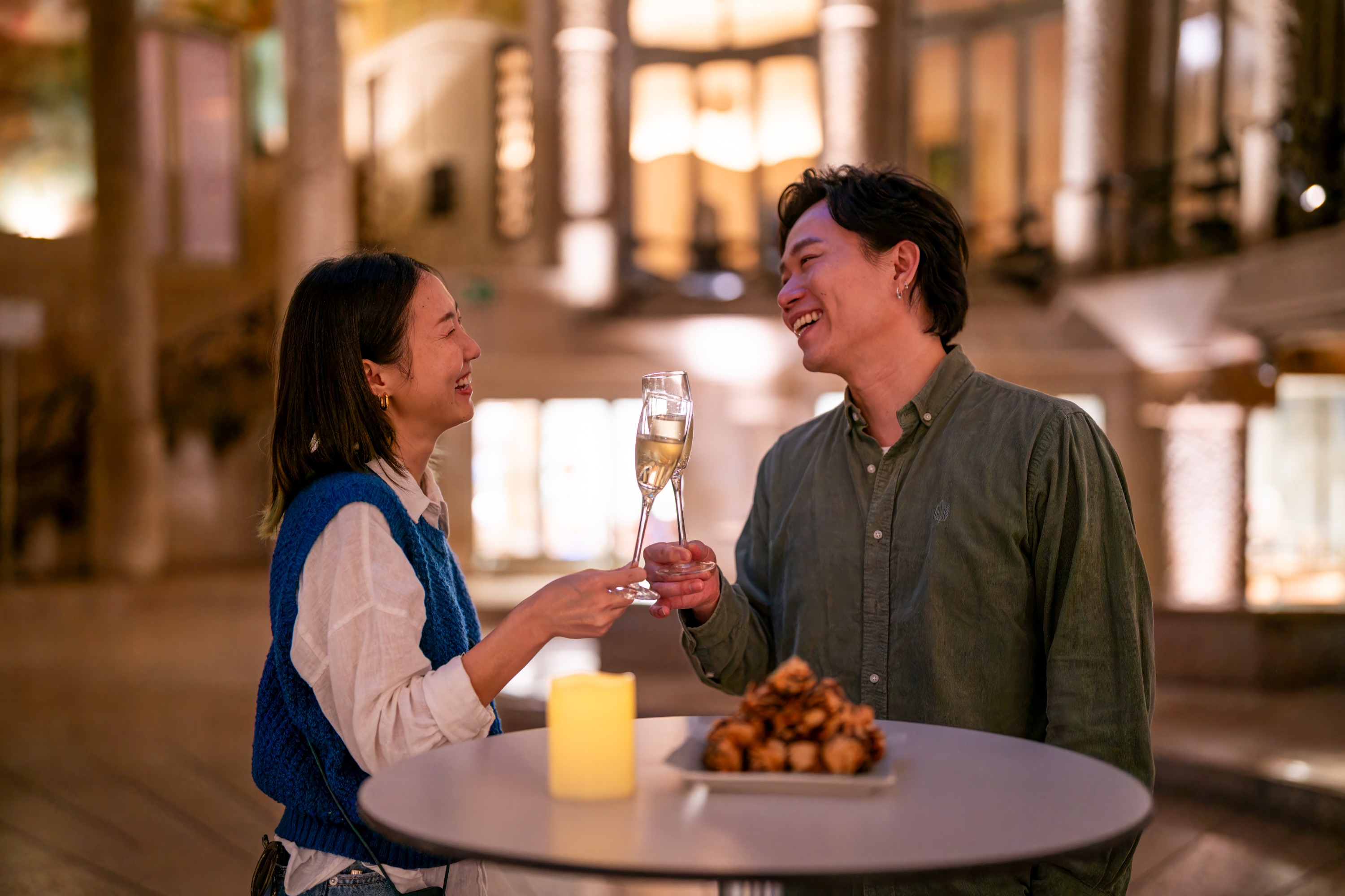 man and woman drinking at the La Pedrera