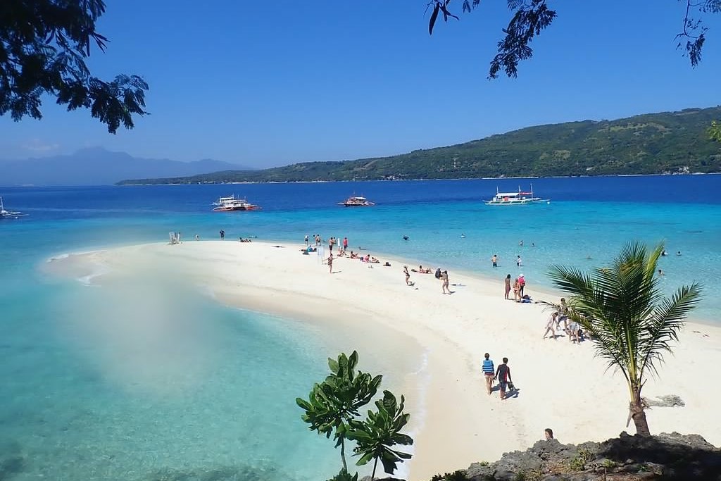 overhead view of tourists on sumilon beach