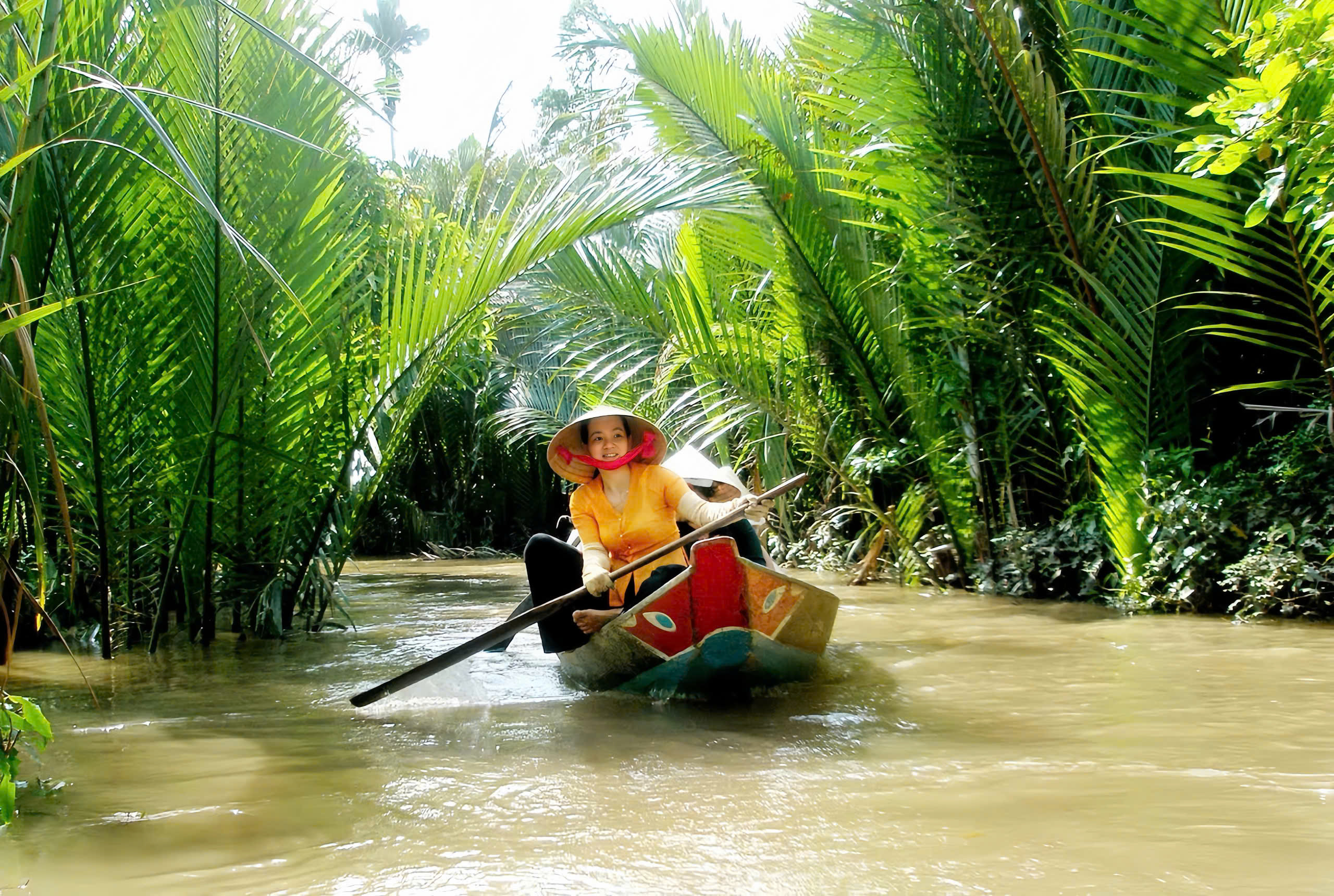 Mekong Delta Guided Tour with VIP Transfer & Coconut Village Visit