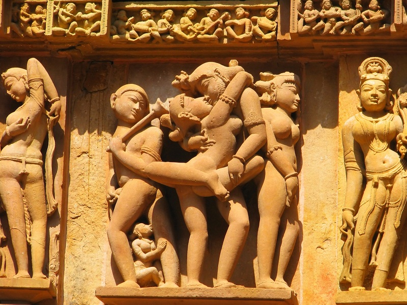 Stone carved erotic sculptures in Hindu temple in Khajuraho.