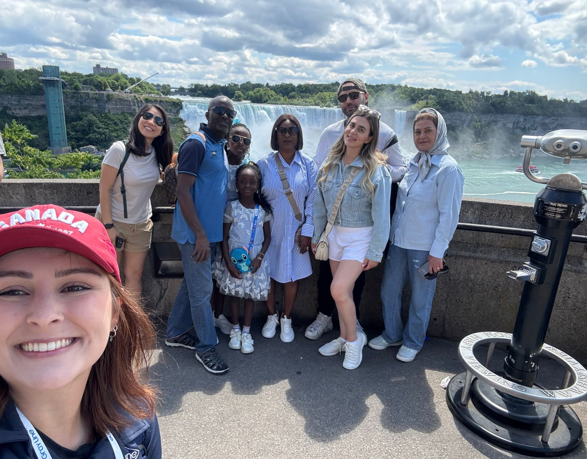 Guests gather along the walkway for panoramic views of both falls on our guided Niagara walking tour.