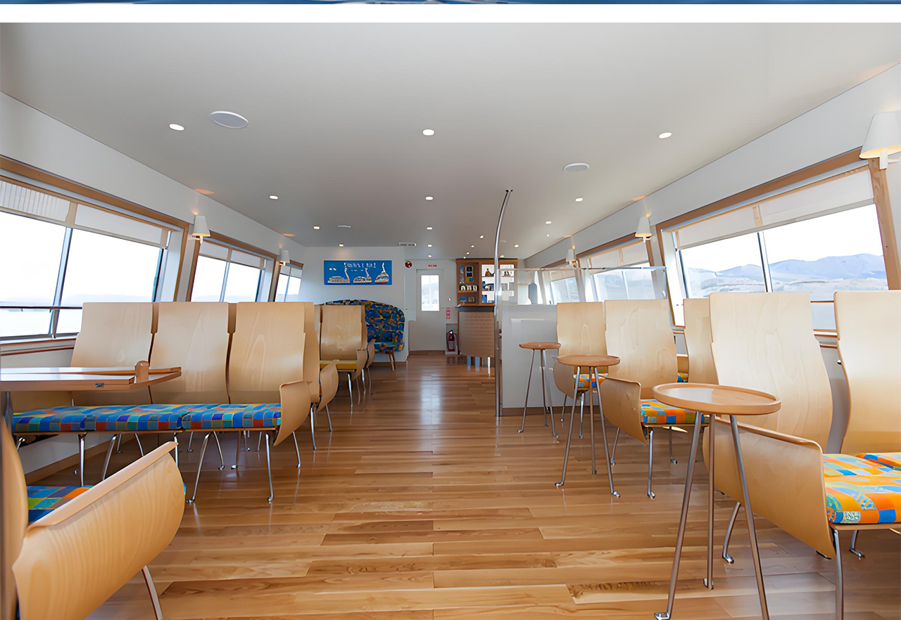 The interior of the boat is exquisitely decorated, using oak and other woods, using wood grain finishes and curved designs to create a warm and soft atmosphere