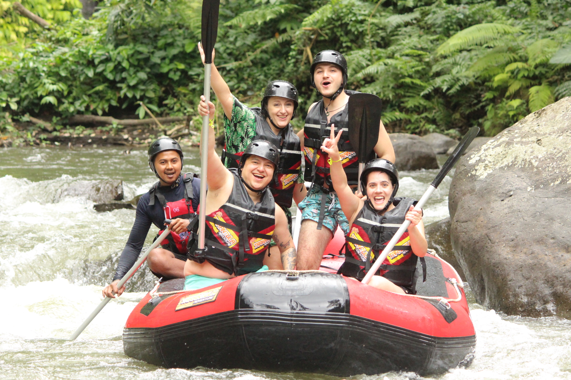 Enjoy an exciting white water rafting experience on the famous Ayung River surrounded by tropical jungle views, waterfalls, and fun river rapids. Enjoy an exciting white water rafting experience on the famous Ayung River surrounded by tropical jungle views, waterfalls, and fun river rapids.