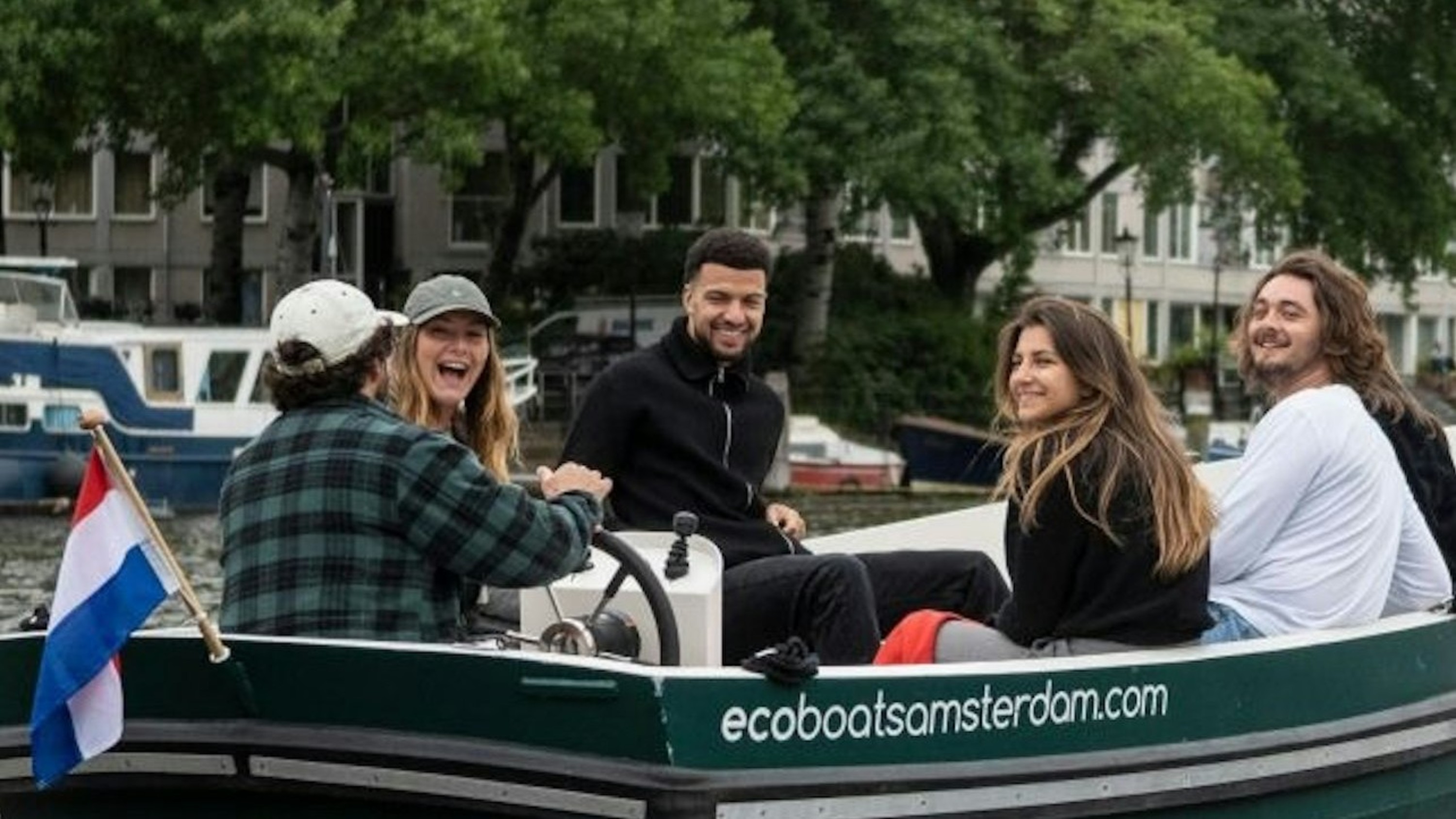 A breezy boat ride with friends filled with laughter while discovering Amsterdam’s hidden gems your own way