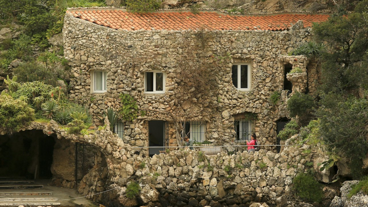 Take in panoramic views where turquoise waves meet ancient limestone cliffs