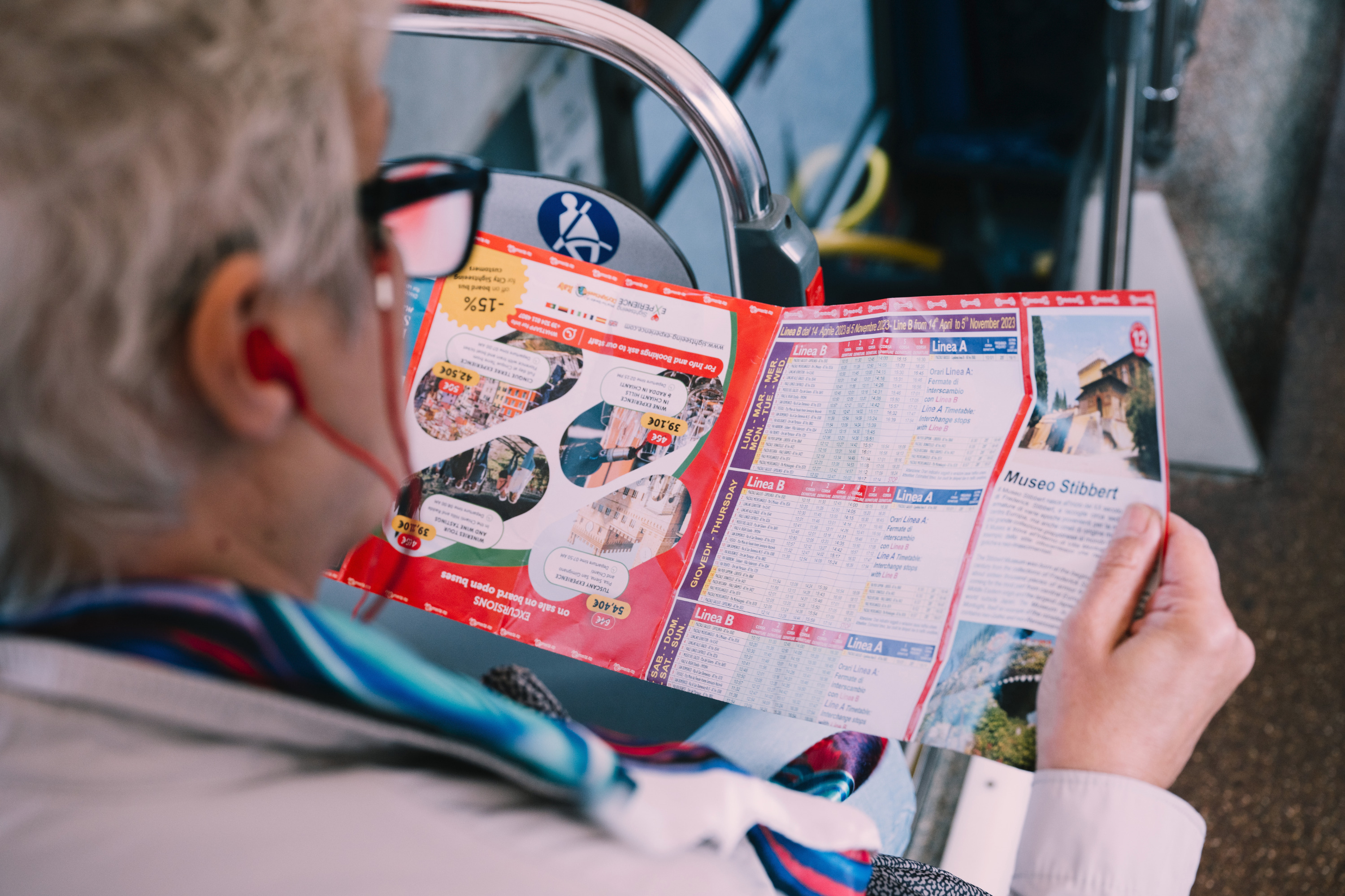 Woman reading a pamphlet
