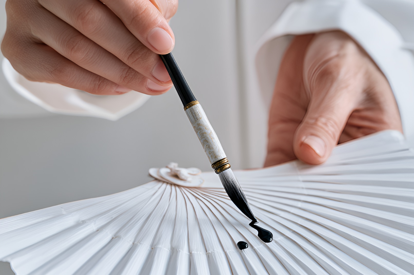 Paint a Korean fan & write your name in Hangeul  over warm flower tea — a quiet 60min morning class  for max 4 guests in Hongdae, Seoul.