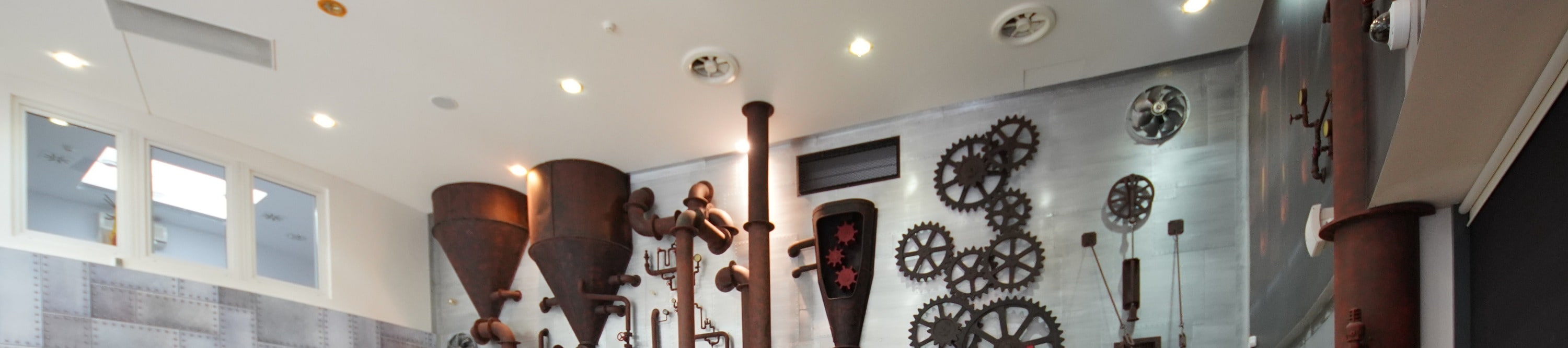 Explore vintage chocolate machines on display.