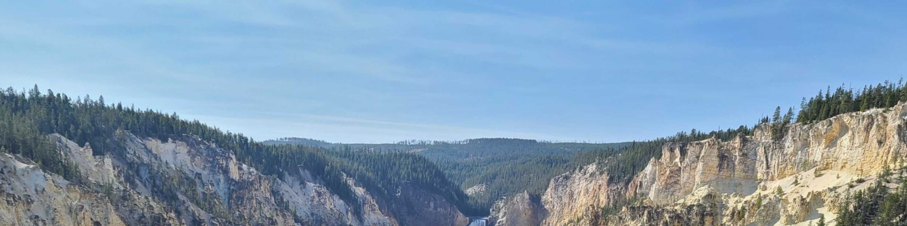 Expansive view of the Grand Canyon of the Yellowstone’s dramatic cliffs