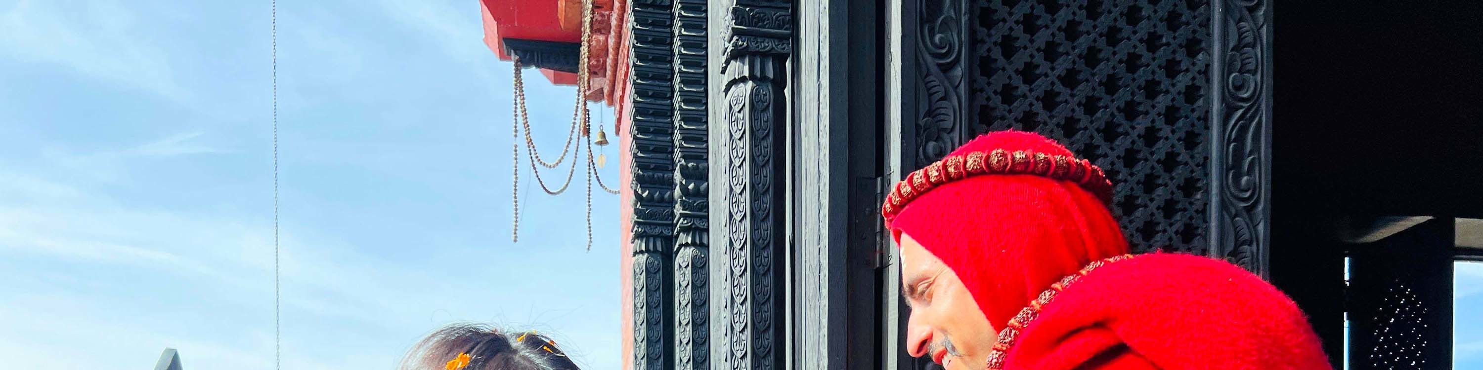 Travelers at the temple in Chandragiri Hills.