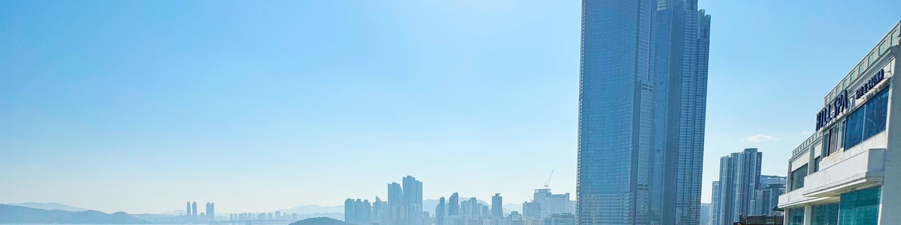 Enjoy the stunning ocean view of Haeundae from our open rooftop at Cafe On The Hill.