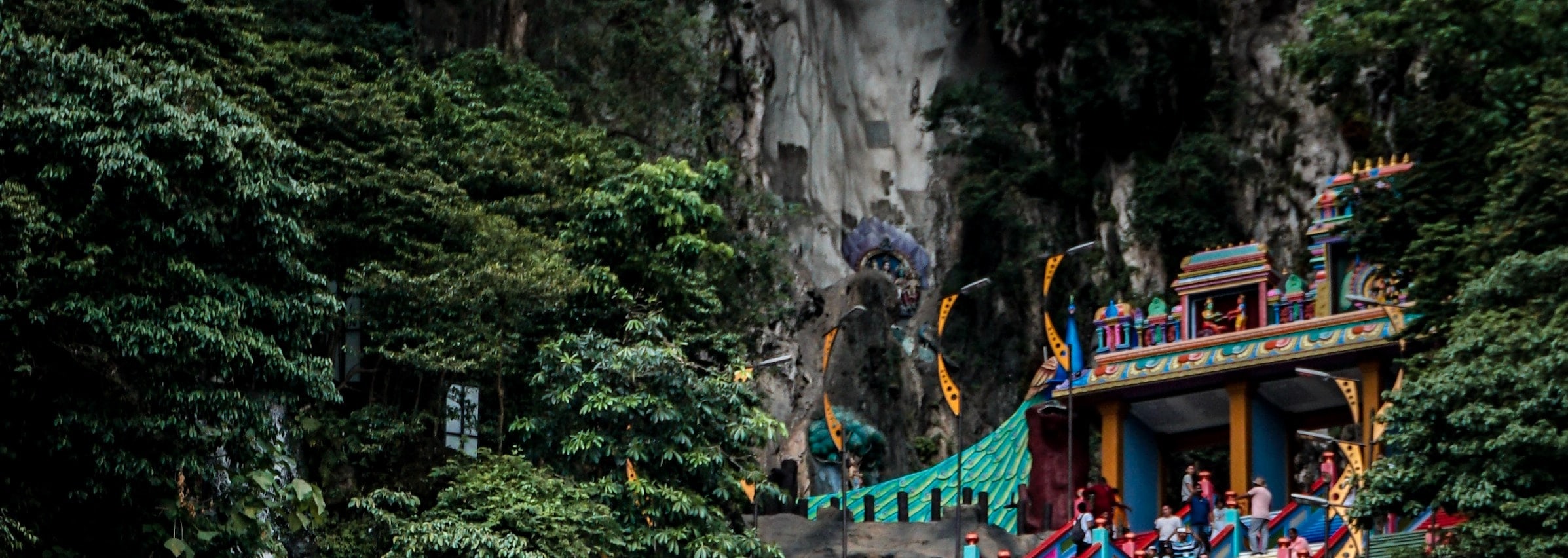 Batu Caves is a limestone hill that houses a series of caves and cave temples. It is one of the most important Hindu shrines outside of India and attracts both religious devotees and tourists