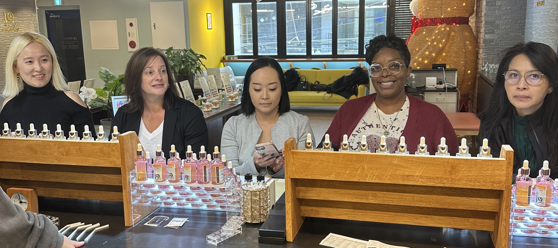 A foreign student in Korea enjoying the art of perfume-making