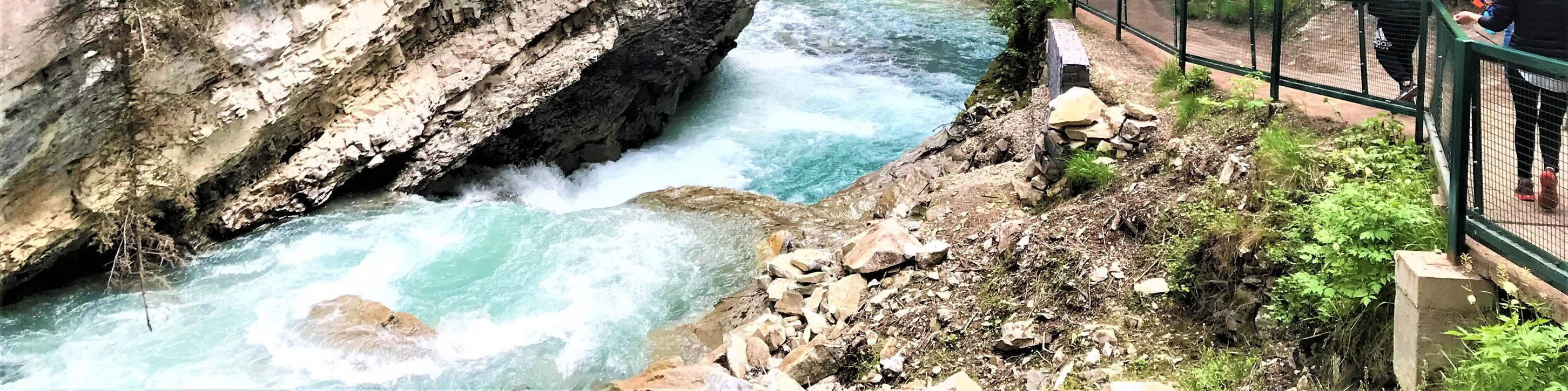 Hike Johnston Canyon trail to discover cascading waterfalls and breathtaking limestone cliff scenery