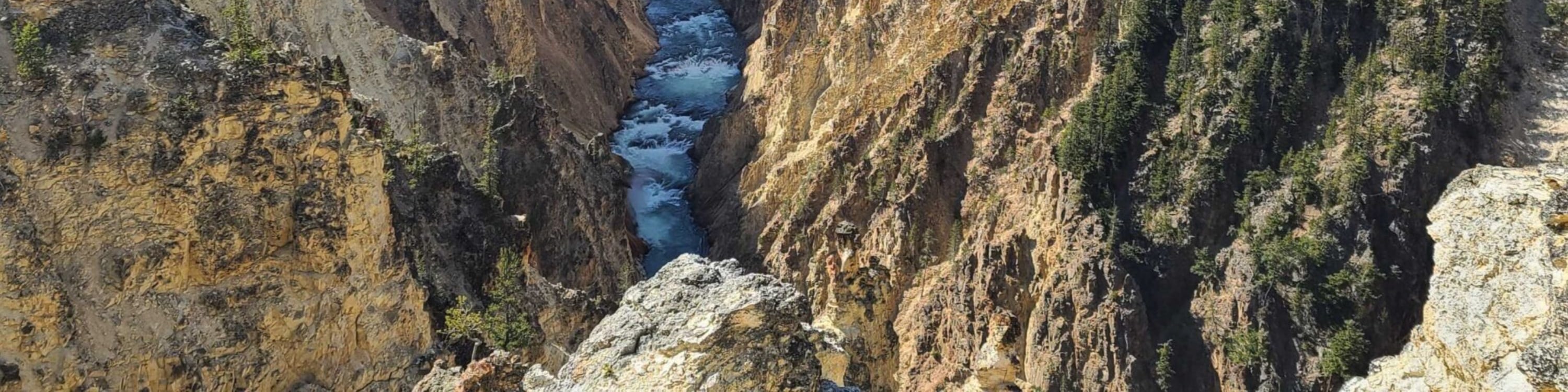 Expansive view of the Grand Canyon of the Yellowstone’s dramatic cliffs