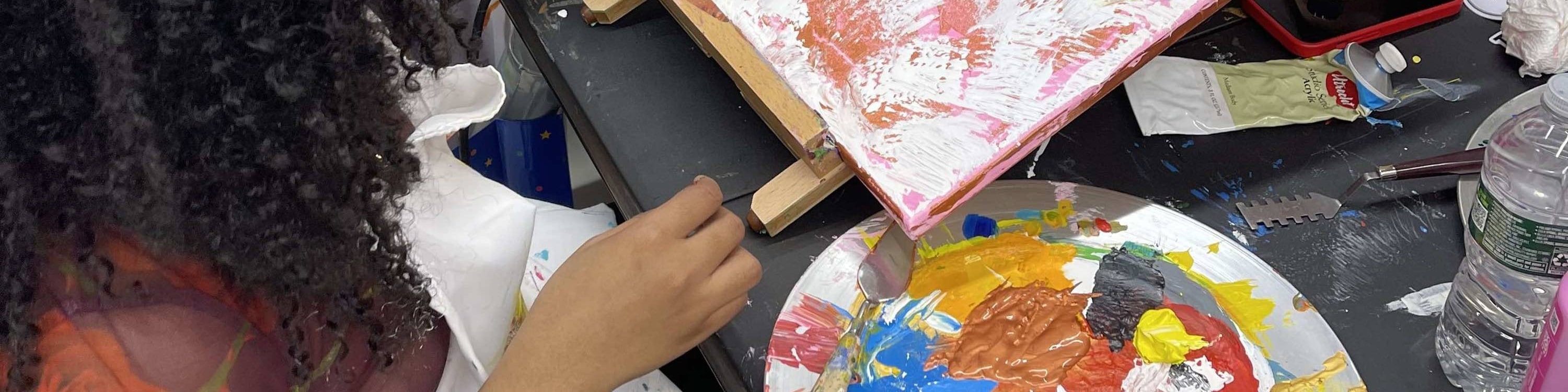 With every stroke, she dives deeper into her creation, lost in the rhythm of palette knife painting