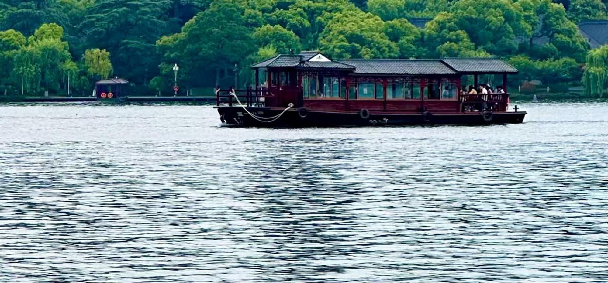 Nestled amidst lush greenery, the Leifeng Pagoda exudes ancient charm, quietly recounting legendary tales of bygone eras.