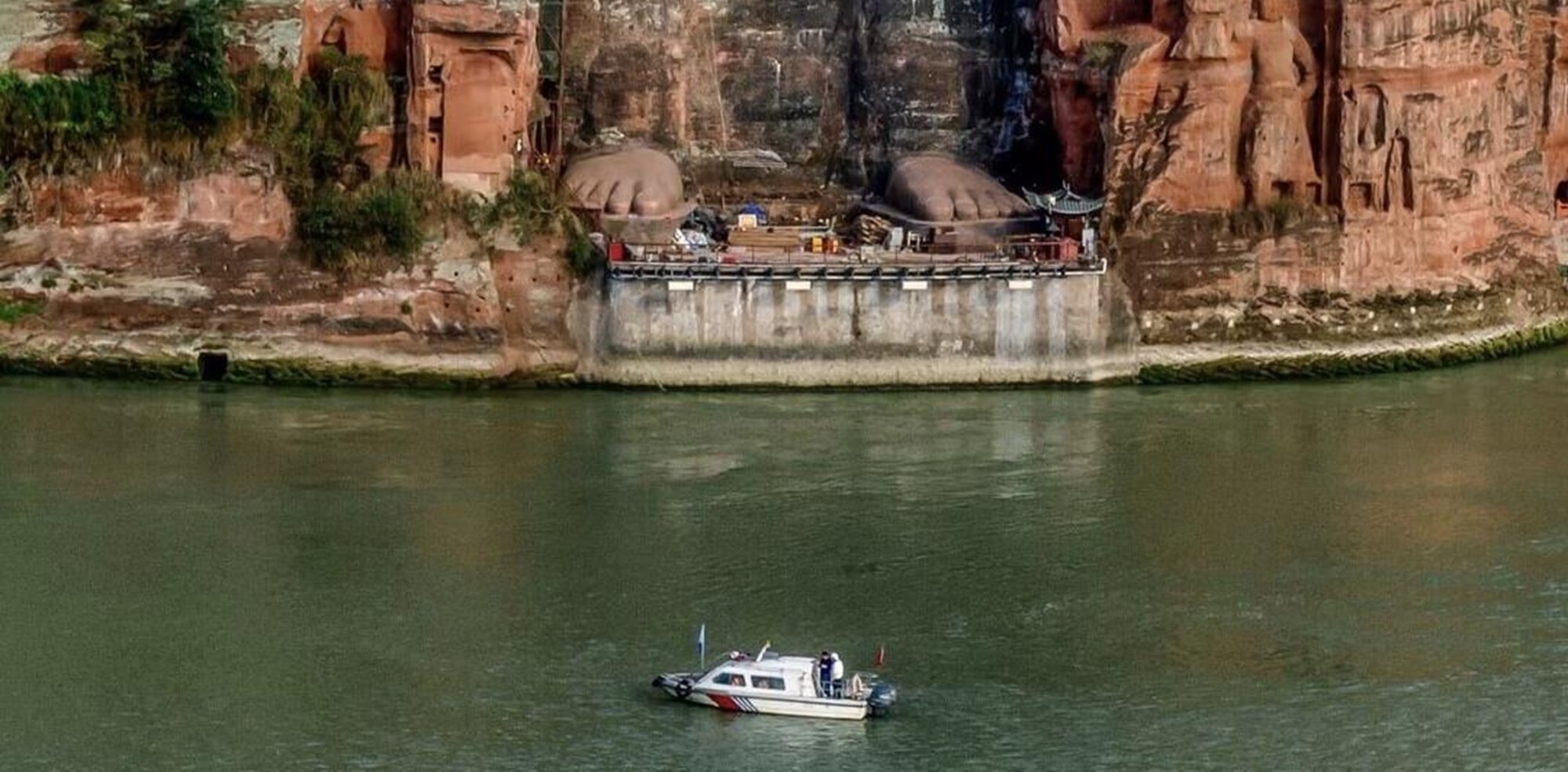 At the confluence of three rivers, the Leshan Giant Buddha stands in silence. See the stone carvings and feel the charm of history and religion among the mountains and rivers