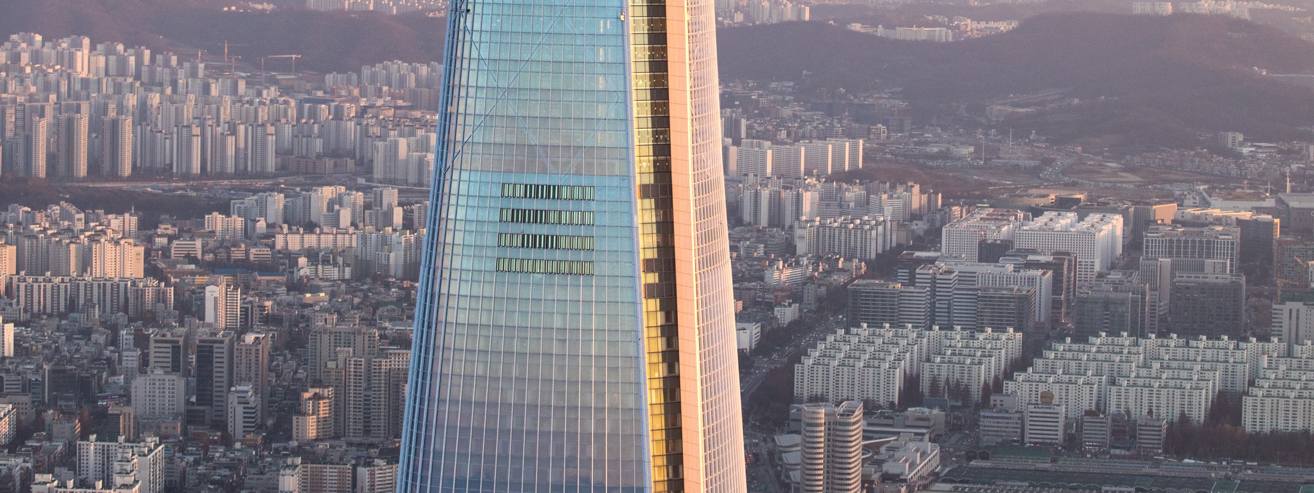 [Seoul Sky] is a stunning observation deck located at the top of Lotte World Tower, offering panoramic views of the city. It’s a must-visit spot for breathtaking skyline views and a unique experience in Seoul.