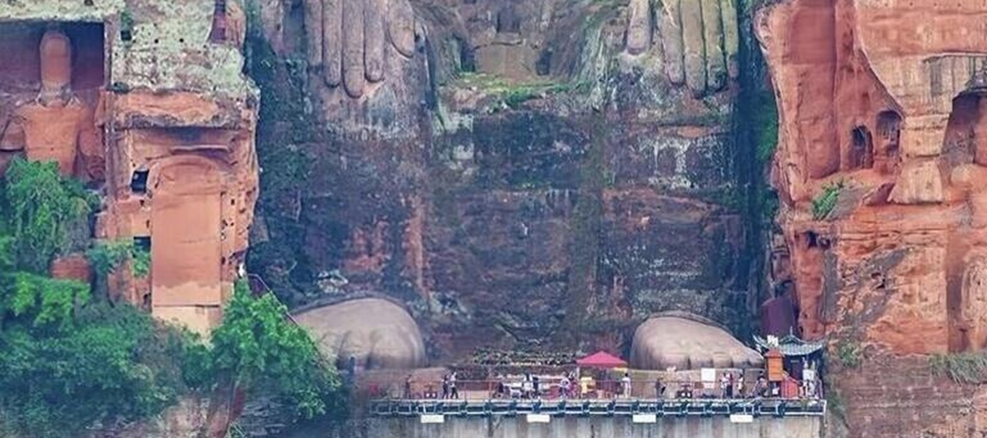 On the top of Leshan Mountain, the Giant Buddha stands tall. Between the green shadows and blue sky, witness the miracles carved by time and start a soul-stirring journey