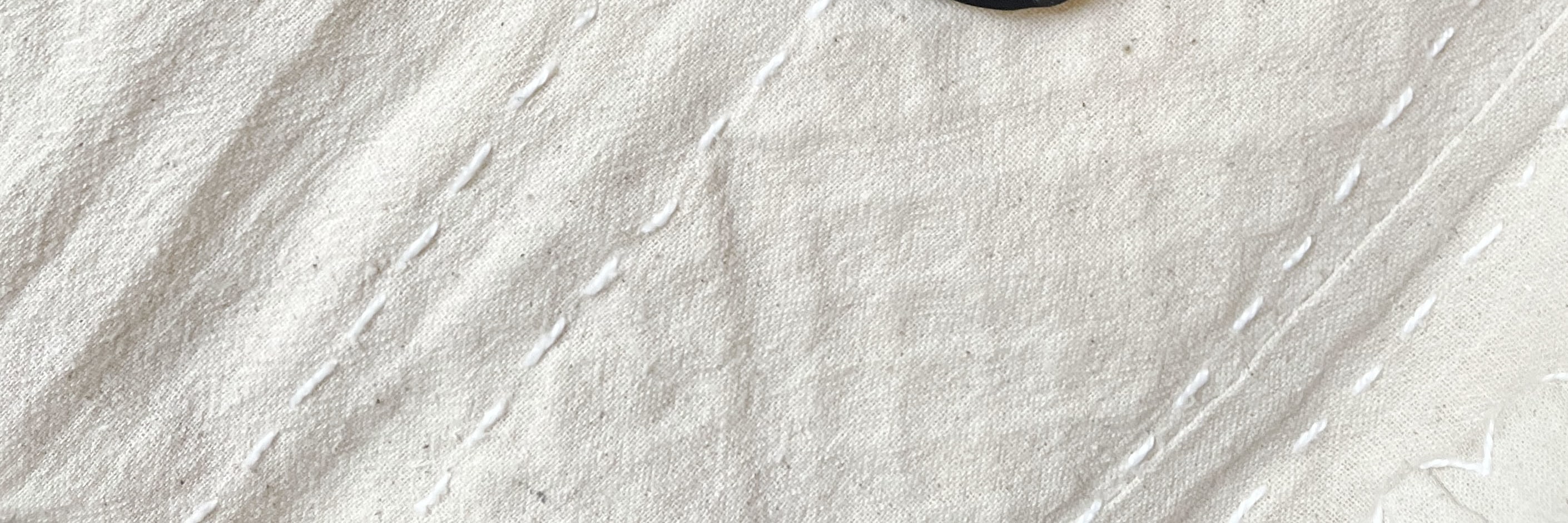 Use leather crafting techniques to easily sew together a loose bag.
