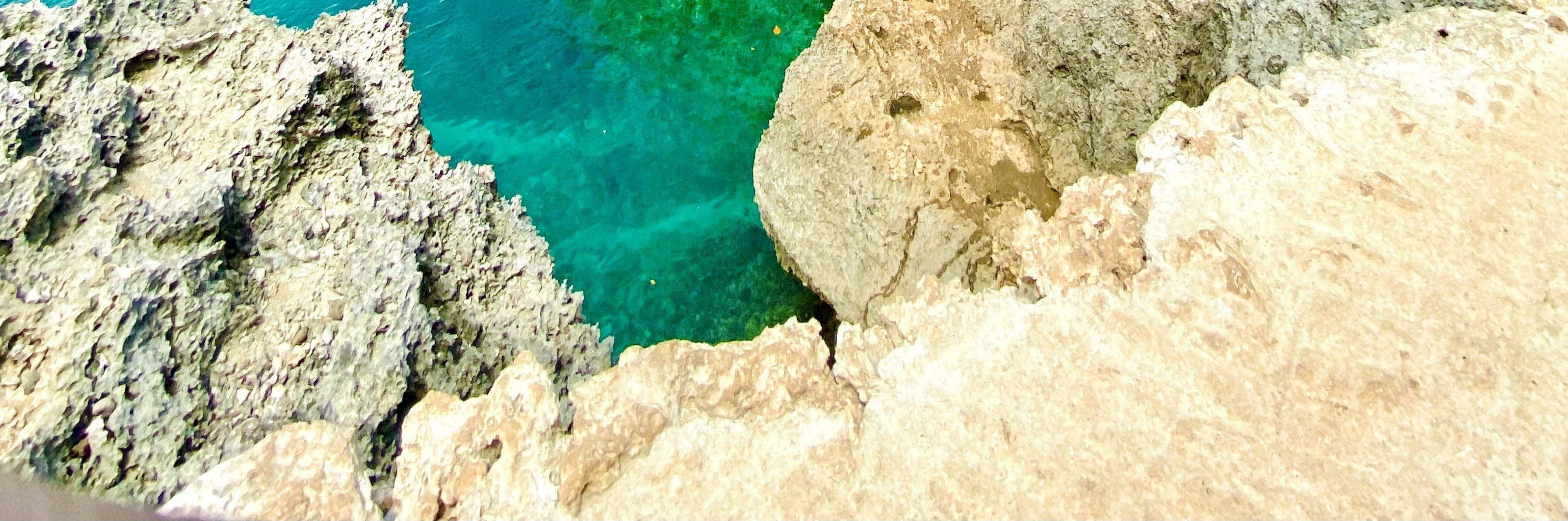 Admire the views from Pitogo Cliff, a stunning spot with breathtaking ocean panoramas.