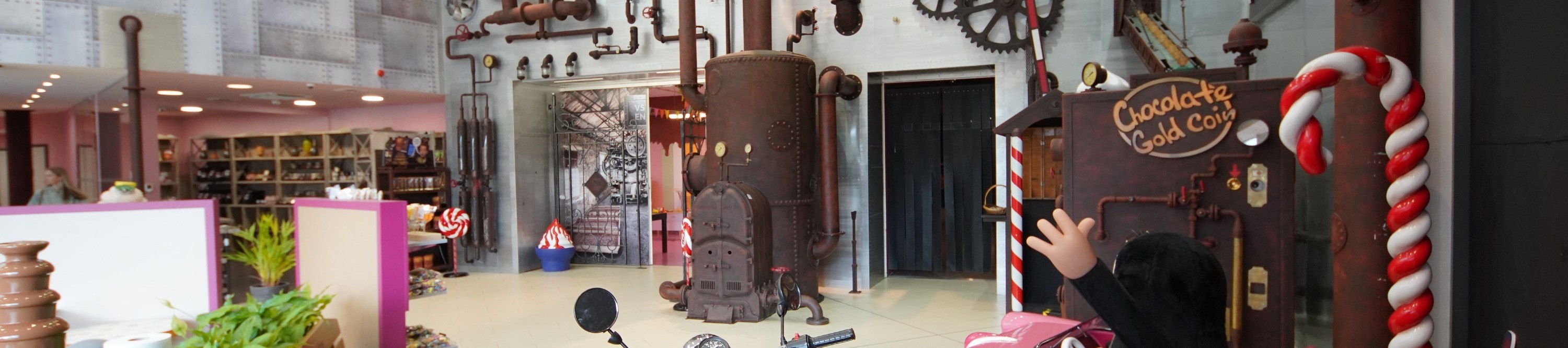 Explore vintage chocolate machines on display.