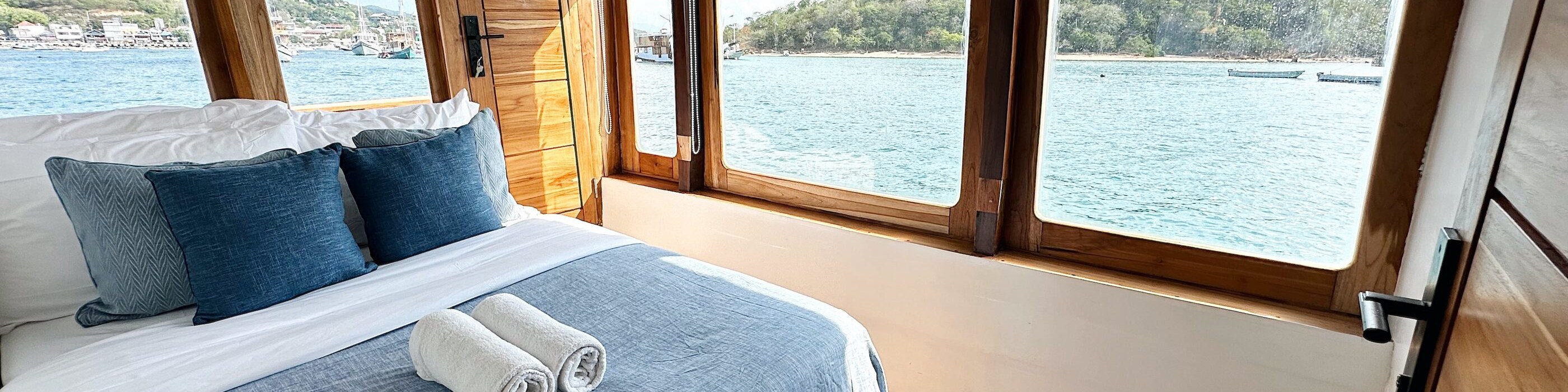 BOAT 2 - Master Cabin with Balcony, we have a total of 4 master cabins, 2 breezy blue themed, and 2 cozy brown themed BOAT 2 - Master Cabin with Balcony, we have a total of 4 master cabins, 2 breezy blue themed, and 2 cozy brown themed
