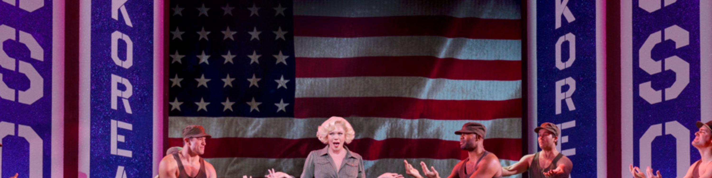 Iconic costumes and bold choreography bring the fictional musical Bombshell to thrilling life