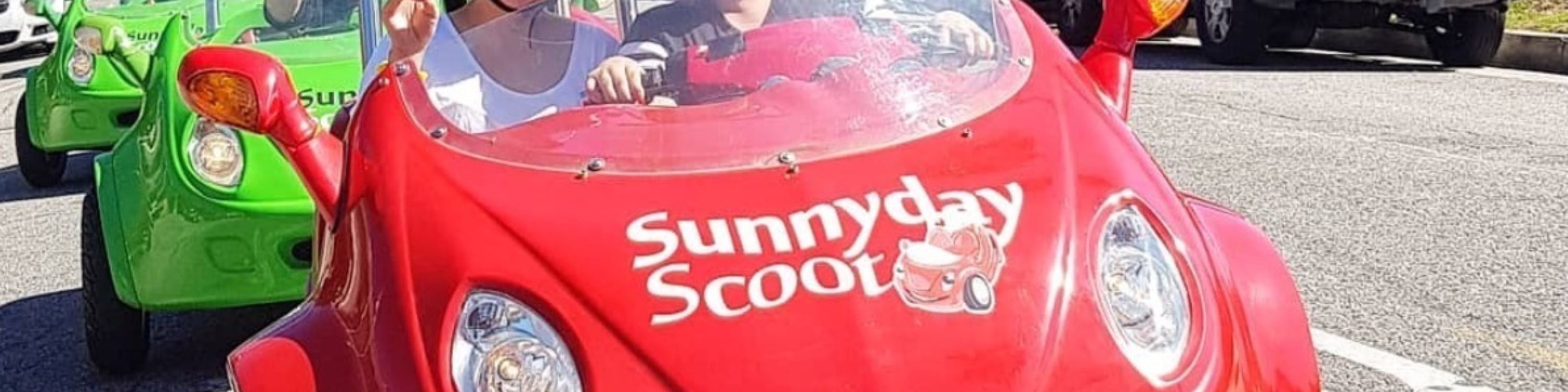 Make unforgettable memories riding with your favorite person in a two-seater scooter car