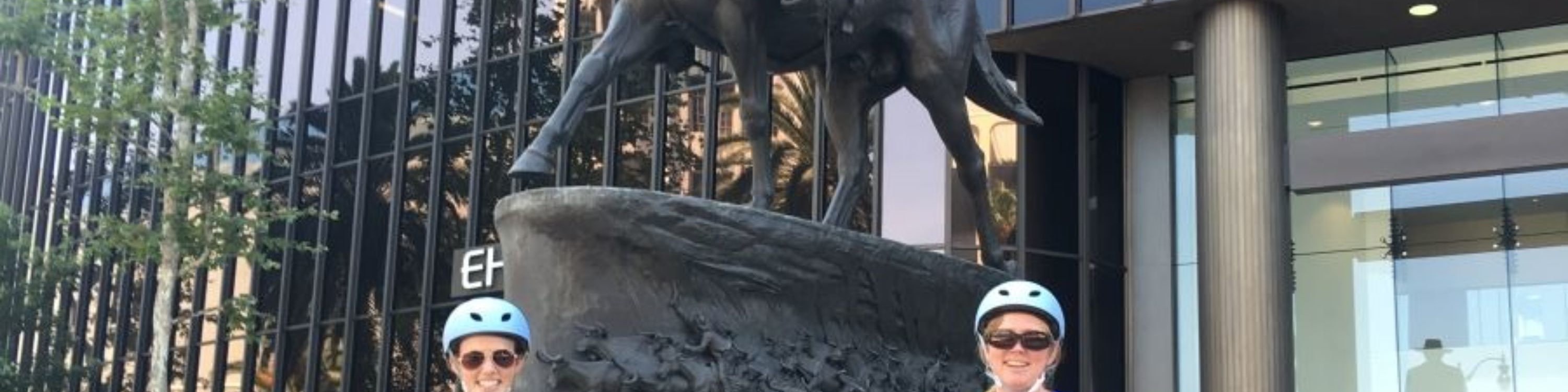 Capture a classic moment with the iconic John Wayne statue on your tour