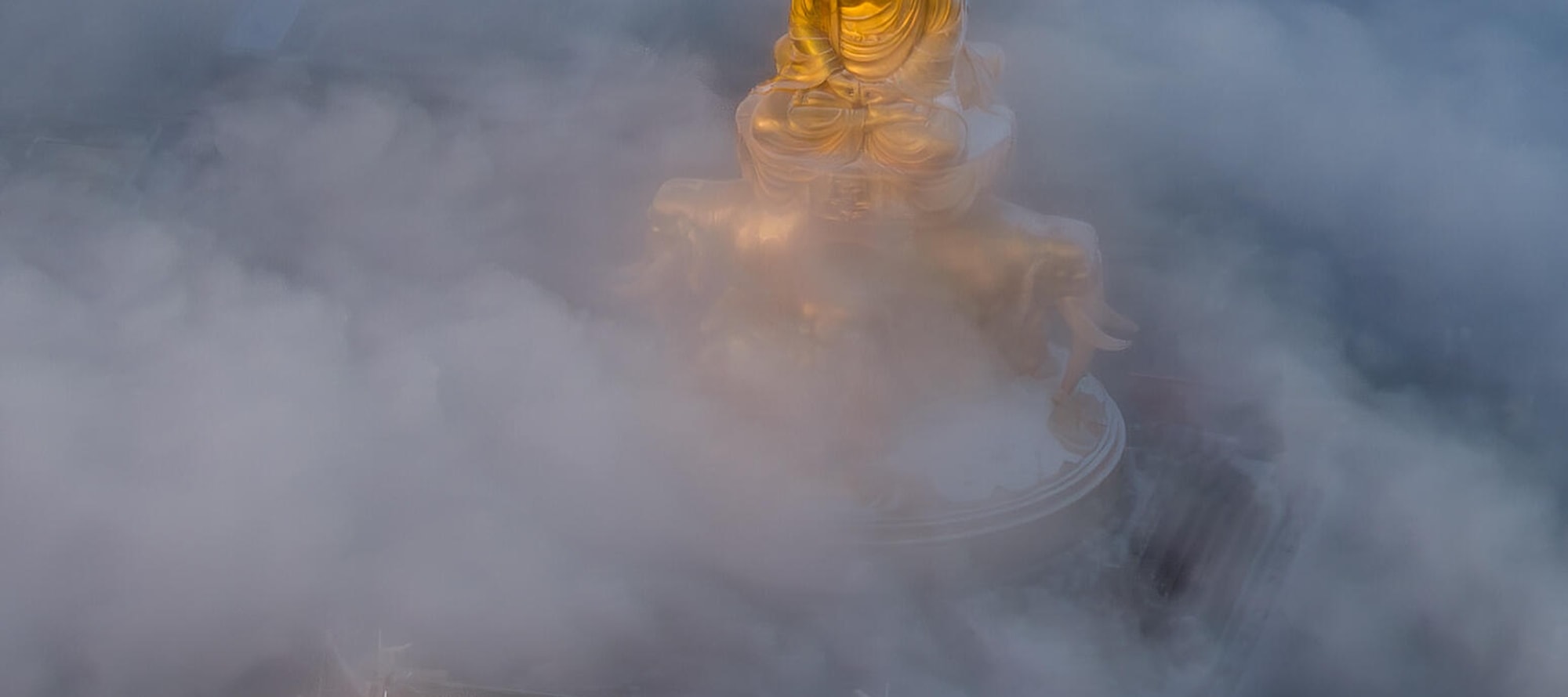 Amidst the mist, the golden Buddha of Mount Emei shines. Encounter the sacred scenery and embark on an extraordinary journey of spiritual purification