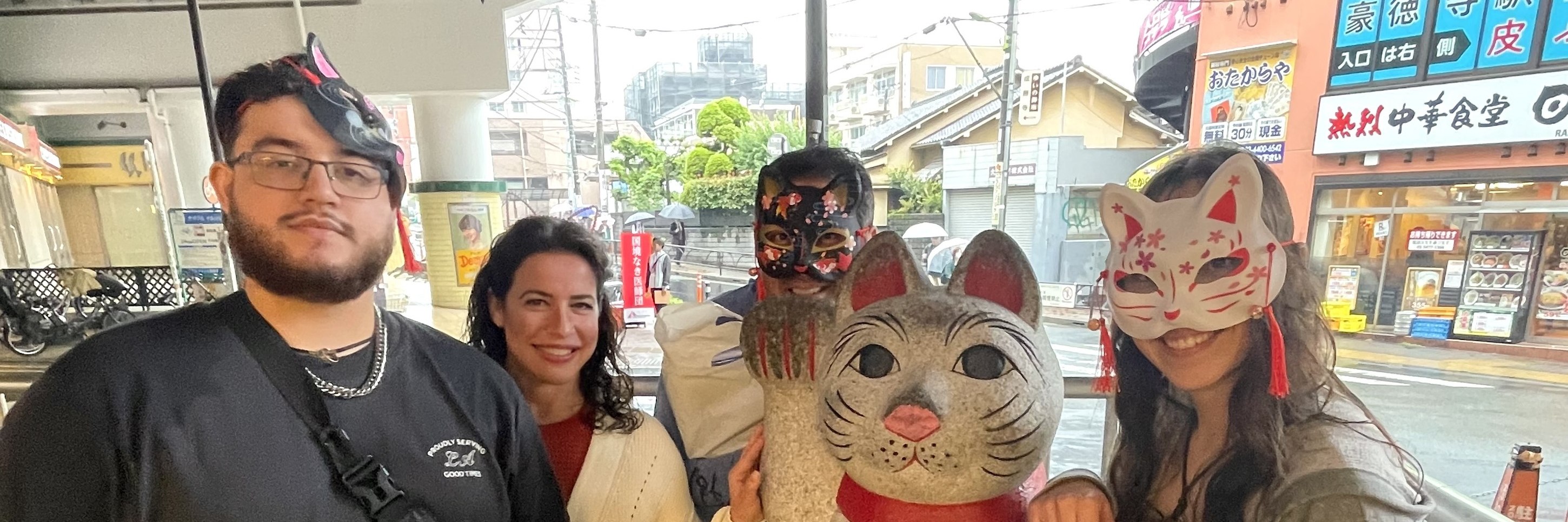 With a lucky cat statue!