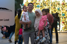 family at christmas orchard