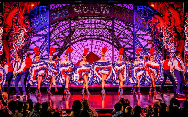 Eiffel Tower Dinner, Seine Cruise, and Moulin Rouge Show Experience