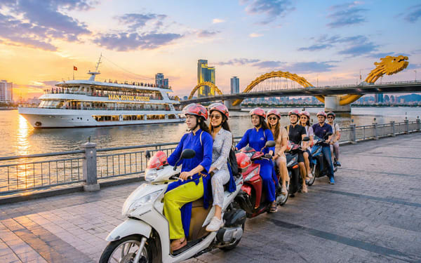 Da Nang City Private Tour and Han Cruise by Night with Aodai Rider